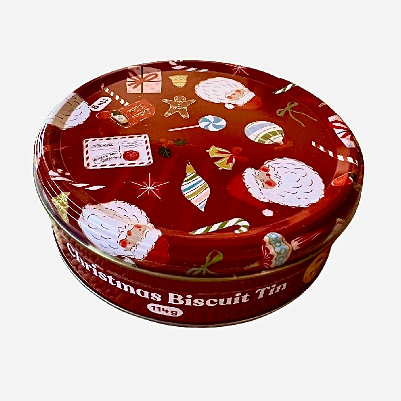 Christmas Stocking with a Christmas tin of biscuits